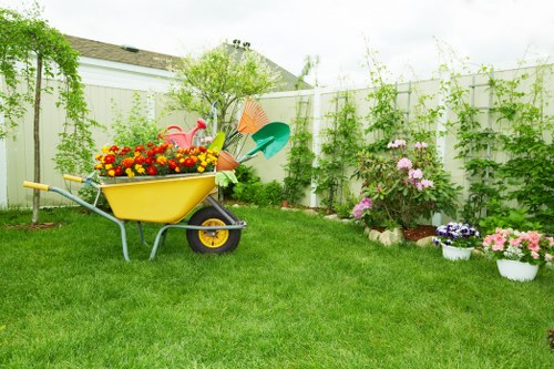 A renovated urban garden in Harlesden with neat paving and fresh planting